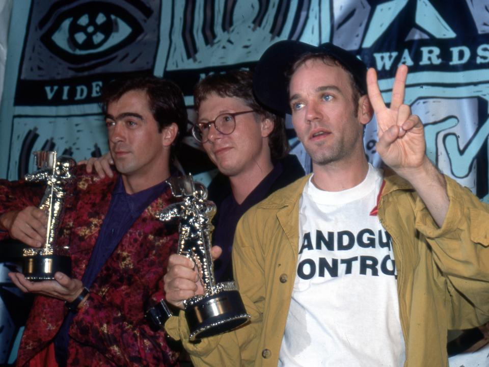 Musicians/singers Bill Berry, Mike Mills and Michael Stipe of R.E.M. group attend the Eighth Annual MTV Video Music Awards on September 5, 1991