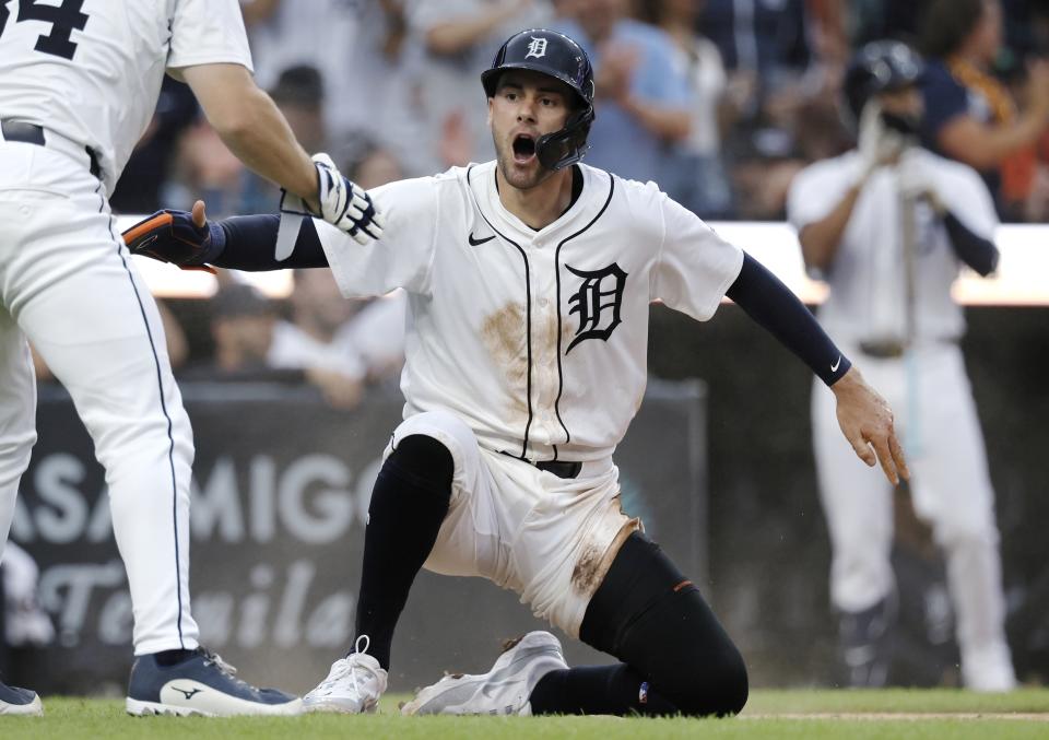 Detroit Tigers' Ryan Kreidler celebrates after scoring against the Philadelphia Phillies on a single by Andy Ibanez during the fifth inning of a baseball game Tuesday, June 25, 2024, in Detroit. (AP Photo/Duane Burleson)