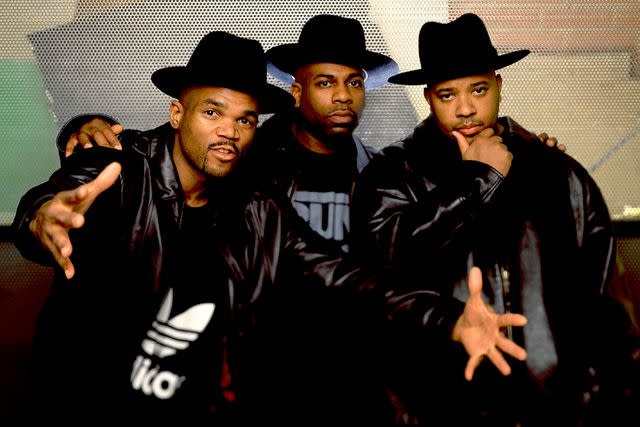 <p>Bob Berg/Getty Images</p> Run-DMC members D.M.C., Jam Master Jay and Run in 1999