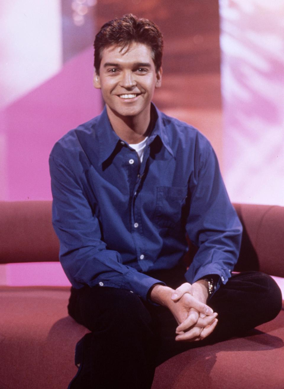Phillip Schofield in the 1980s. The presenter has been a fixture on entertainment shows for four decades. (Rex)