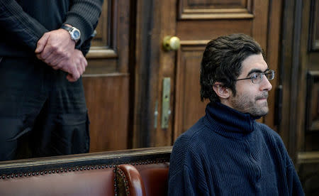 Palestinian asylum seeker and radicalised Islamist Ahmad A., who killed one person and injured six others in a knife attack in a Hamburg supermarket in July, waits for his sentence in Hamburg, Germany, March 1, 2018. REUTERS/Axel Heimken/Pool