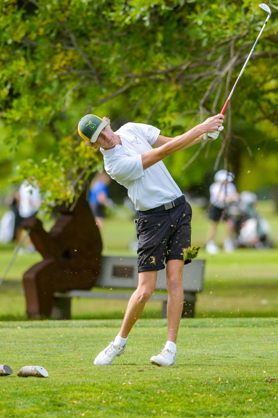 CMR's Eli Groshell tees off on the 17th hole during the Eastern AA golf tournament at Eagle Falls Golf Course in 2021.