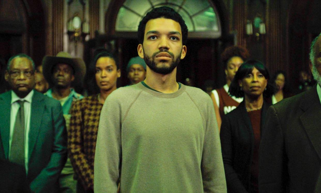 <span>Justice Smith in ‘warm, fuzzy’ The American Society of Magical Negroes.</span><span>Photograph: Landmark Media/Alamy</span>