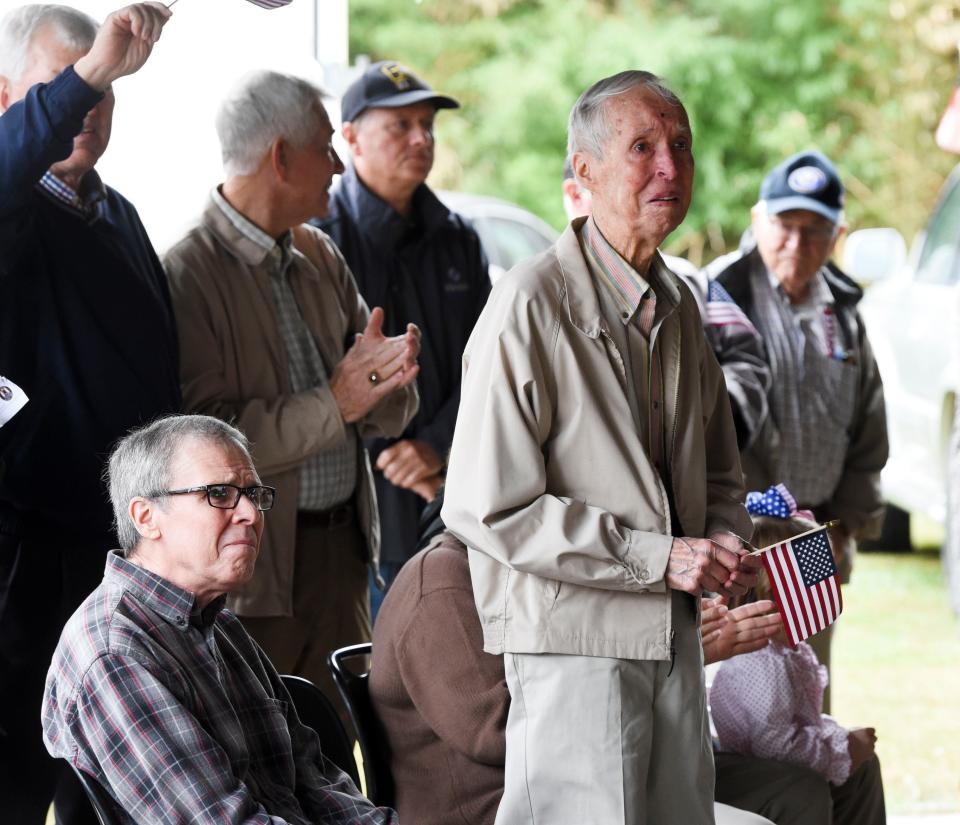 Nov 11, 2022; Tuscaloosa, AL, USA; Veterans stand to be recognized as they band plays the song of each service during the annual observance of Veterans Day in Tuscaloosa Friday, Nov. 11, 2022. 