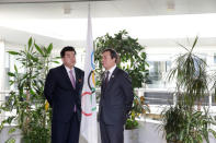 North Korea's Olympic Committee President and Minister of Physical Culture and Sports Kim Il Guk and South Korean Sports Minister Do Jong-hwan talk during a working meeting to discuss further sports cooperation between the Republic of Korea (ROK) and the Democratic People’s Republic of Korea (DPRK) as well as their bid to co-host the 2032 Summer Olympics, at the IOC Headquarters in Lausanne, Switzerland, February 15, 2019. Salvatore Di Nolfi/Pool via REUTERS