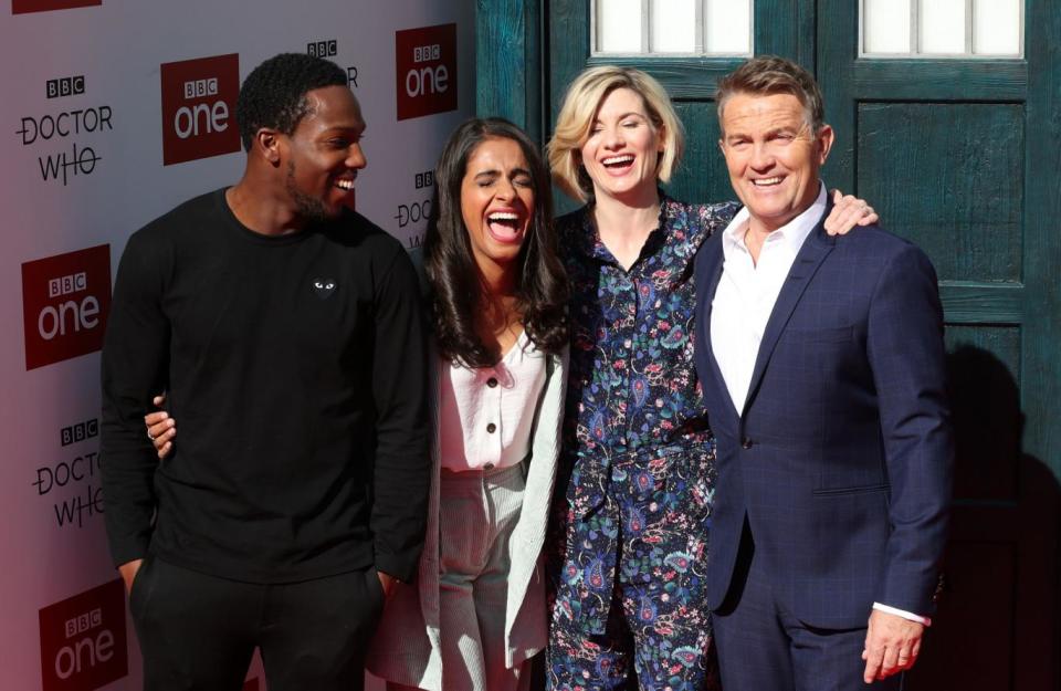 Having a laugh: Tosin Cole and Mandip Gill pose with Jodie Whittaker and Bradley Walsh (PA)