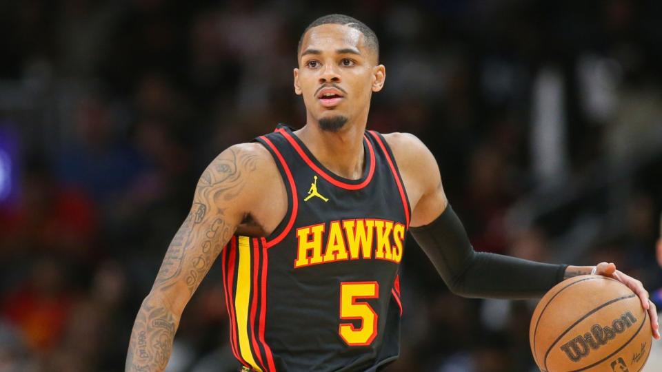 Nov 15, 2023; Atlanta, Georgia, USA; Atlanta Hawks guard Dejounte Murray (5) dribbles against the New York Knicks in the second half at State Farm Arena. Mandatory Credit: Brett Davis-USA TODAY Sports