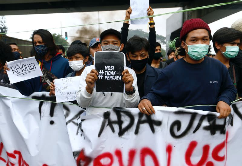 University students protest the government's labour reforms bill in Jakarta