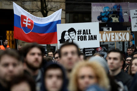 FILE PHOTO: Demonstrators attend a protest called "Let's stand for decency in Slovakia" in reaction to the murder of Slovak investigative reporter Jan Kuciak and his fiancee Martina Kusnirova, in Bratislava, Slovakia March 9, 2018. REUTERS/Radovan Stoklasa