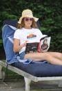 <p>Brooke Shields is seen paging through Howard Stern’s new book while wearing a shirt supporting Sunrise Day Camp on Thursday in the Hamptons. </p>