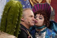 Actor Bob Odenkirk is kissed during a roast while being honored as Man of the Year by Harvard University's Hasty Pudding Theatricals, Thursday, Feb. 2, 2023, in Cambridge, Mass. (AP Photo/Charles Krupa)