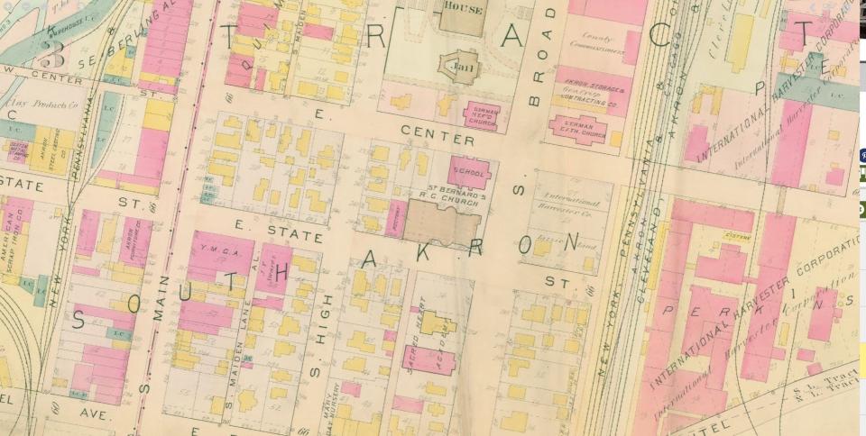 A 1915 plat map shows some of the residences and commercial buildings in downtown Akron, including the houses behind St. Bernard Catholic Church.
