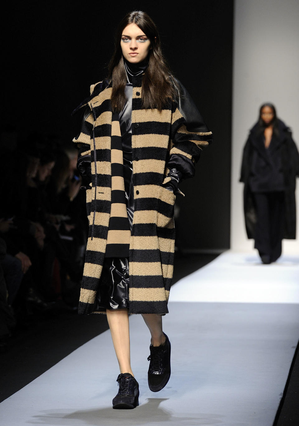 A model wears a creation for Max Mara women's Fall-Winter 2013-14 collection, part of the Milan Fashion Week, unveiled in Milan, Italy, Thursday, Feb. 21, 2013. (AP Photo/Giuseppe Aresu)