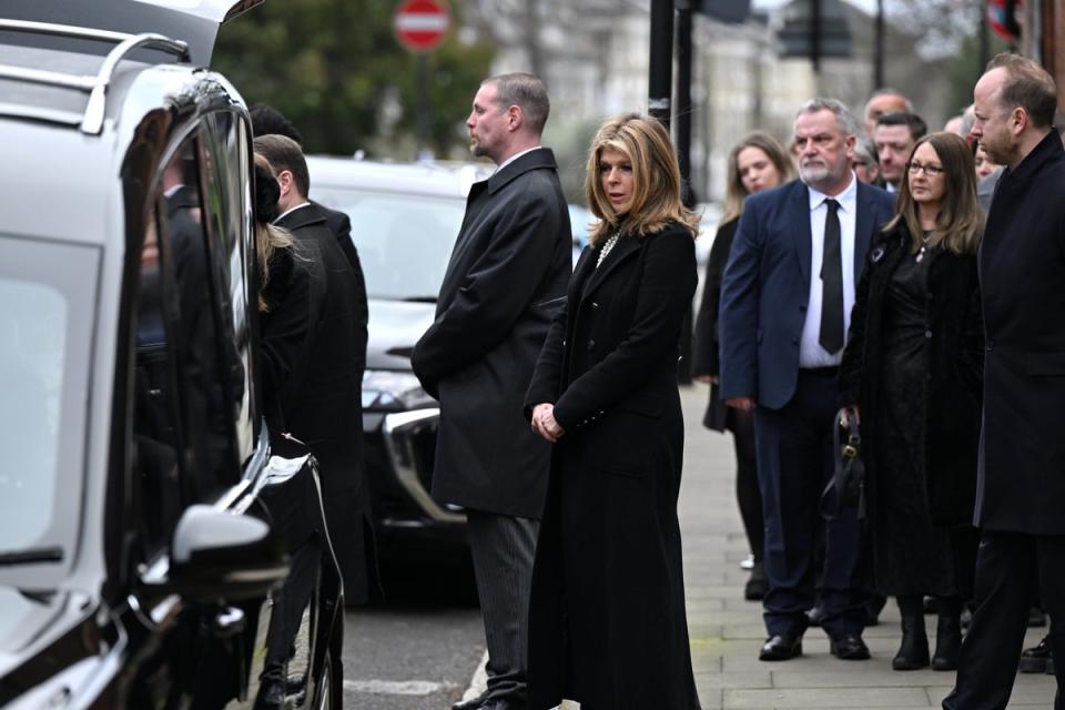 Ms Garraway attends the funeral of her husband Draper at the church where they got married 18 years ago (Getty Images)