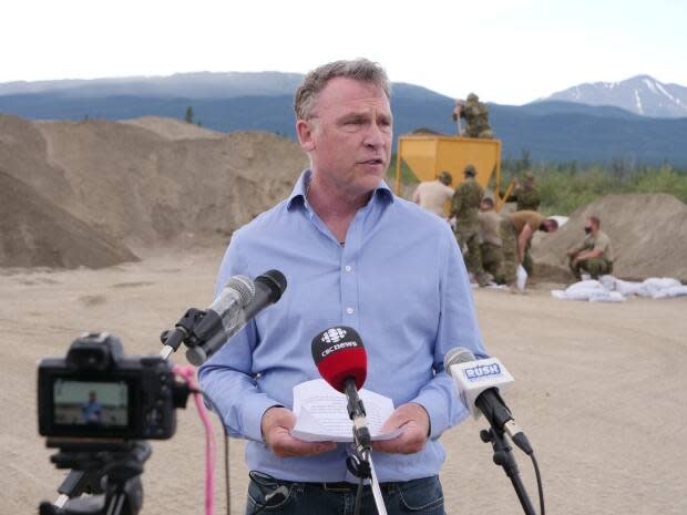 'We're quite confident now that we may have seen the water peak,' said Yukon Community Services Minister Richard Mostyn, seen here at Army Beach in early July. (Vincent Bonnay/Radio-Canada - image credit)