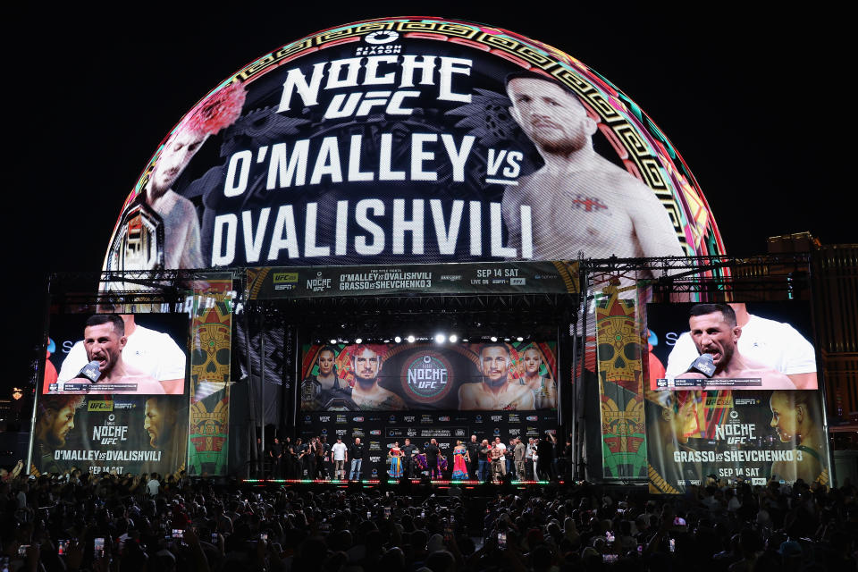 LAS VEGAS, NEVADA - SEPTEMBER 13:  Merab Dvalishvili speaks with commentator Joe Rogan during a ceremonial weigh-in with UFC bantamweight champion Sean O'Malley at Sphere on September 13, 2024 in Las Vegas, Nevada. O'Malley is scheduled to defend his title against Dvalishvili at UFC 306 on September 14 at Sphere. (Photo by Christian Petersen/Getty Images)