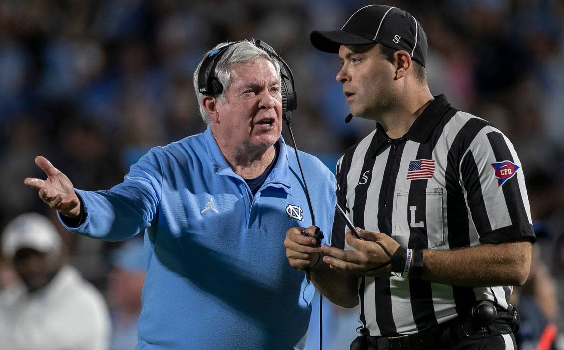 North Carolina coach Mack Brown argues with official Brian Perry after a penalty against the Tar Heels in the first quarter against Duke on Saturday, October 15, 2022 at Wallace-Wade Stadium in Durham, N.C. Robert Willett/rwillett@newsobserver.com