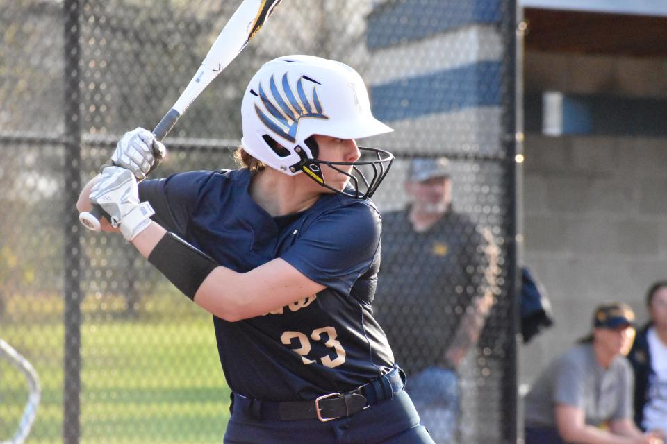 Decatur Central's Ella Phillips prepares to take a swing at a pitch during the Hawks' rivalry matchup with Mooresville on April 12, 2022.