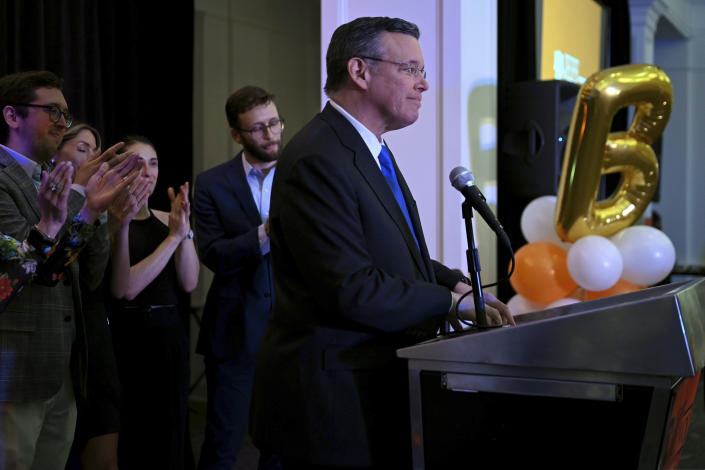 Jeff Brown, a candidate for the Democratic nomination to Philadelphia mayor, is joined by his family as he concedes the election, at his watch party Tuesday, May 16, 2023, in Philadelphia. Cherelle Parker won the nomination. (Tom Gralish/The Philadelphia Inquirer via AP)