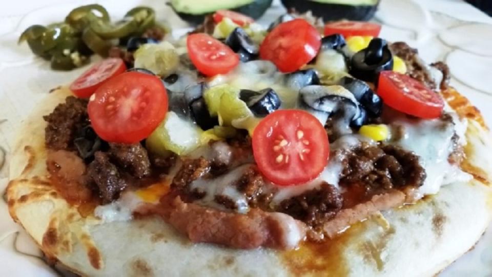 <p>Moore or Less Cooking</p><p>Turn any night into Mexican Night with this delicious layered pizza!</p><p><strong>Get Recipe: </strong><a href="https://mooreorlesscooking.com/mexican-pizza-sundaysupper/" rel="nofollow noopener" target="_blank" data-ylk="slk:Mexican Pizza;elm:context_link;itc:0;sec:content-canvas" class="link "><strong>Mexican Pizza</strong></a></p>