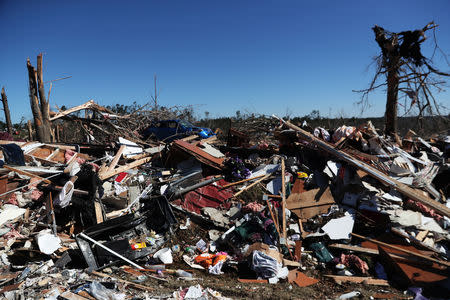 Debris lays outside a house devastated after two deadly back-to-back tornadoes, in Beauregard, Alabama, U.S., March 5, 2019. REUTERS/Shannon Stapleton