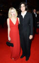 <b>Peaches Geldof & Tom Cohen</b><br><br> Pregnant Peaches looked stunning in a floor length red gown with husband, rocker Tom Cohen.