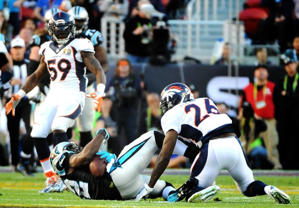 Carolina Panthers wide receiver Jerricho Cotchery tries to maintain control of the ball as he lands on the turf during the first quarter of Super Bowl 50 on Feb. 7, 2016. Cotchery bobbled the pass and it was eventually ruled incomplete, even after a Carolina replay challenge. Two plays later, the Panthers gave up a sack-fumble touchdown to Denver’s defense. The Broncos defeated the Carolina Panthers, 24-10. Jeff Siner/jsiner@charlotteobserver.com