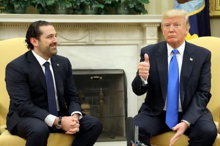 U.S. President Donald Trump meets with Lebanese Prime Minister Saad al-Hariri in the Oval Office of the White House in Washington, U.S., July 25, 2017. REUTERS/Carlos Barria