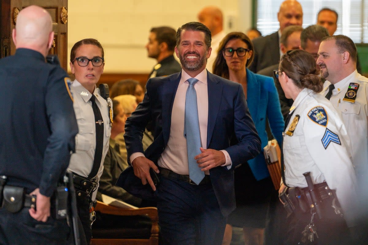 Donald Trump Jr smiles after his testimony in Judge Arthur Engoton’s courtroom on 2 November (Getty Images)