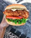 <p>With a tagline "Eat Mor Chikin’," their chicken better be out of this world and lucky for them—it is. It’s all in the details with their <a href="https://www.chick-fil-a.com/menu-items/spicy-chicken-sandwich" rel="nofollow noopener" target="_blank" data-ylk="slk:Spicy Chicken Sandwich;elm:context_link;itc:0;sec:content-canvas" class="link ">Spicy Chicken Sandwich</a> and even some of the smallest ingredients can make a big impact. Not only is the chicken seasoned with a spicy blend of peppers and is hand-breaded, but it’s also pressure cooked in 100% refined peanut oil. With dill pickles and a toasted, buttered bun with a deluxe option, the cherry on top to this near perfect sandwich is which iconic Chick-Fil-A sauce you’ll use. If spicy is too hot for you, their Original Chicken Sandwich is on point too. </p>