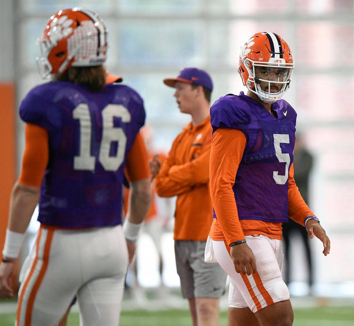 Clemson backup quarterback D.J. Uiagalelei (right) has been studying Trevor Lawrence closely since arriving on campus.