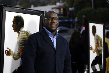 Director and producer of the movie "12 Years a Slave" Steve McQueen poses at a special screening of the movie at the Directors Guild of America in Los Angeles, California in this October 14, 2013 file photo. REUTERS/Mario Anzuoni/Files