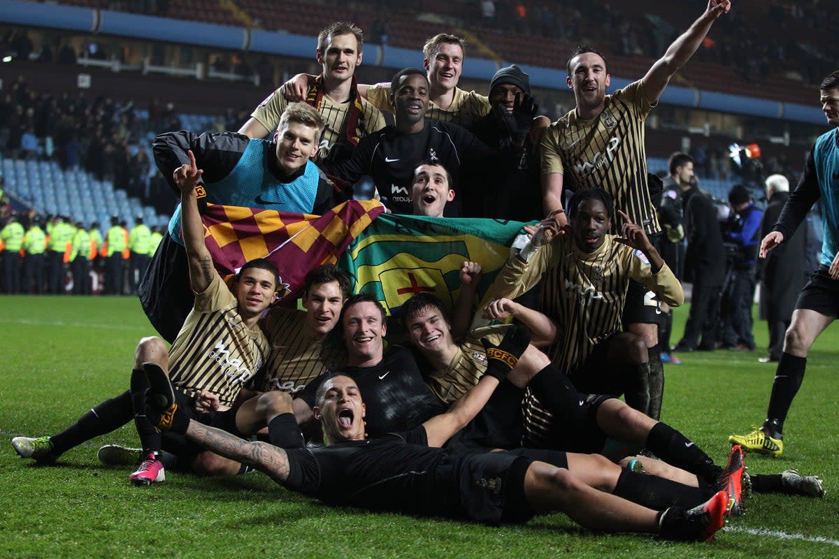 Bradford’s players celebrate after beating Aston Villa on aggregate to make the League Cup final in 2013 (Nick Potts/PA). (PA Archive)