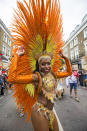 <p>A performer takes part in the Notting Hill Carnival on August 29, 2016 in London, England. The Notting Hill Carnival, which has taken place annually since 1964, is expected to attract over a million people. The two-day event, started by members of the Afro-Caribbean community, sees costumed performers take to the streets in a parade and dozens of sound systems set up around the Notting Hill streets. (Photo by Jack Taylor/Getty Images) </p>