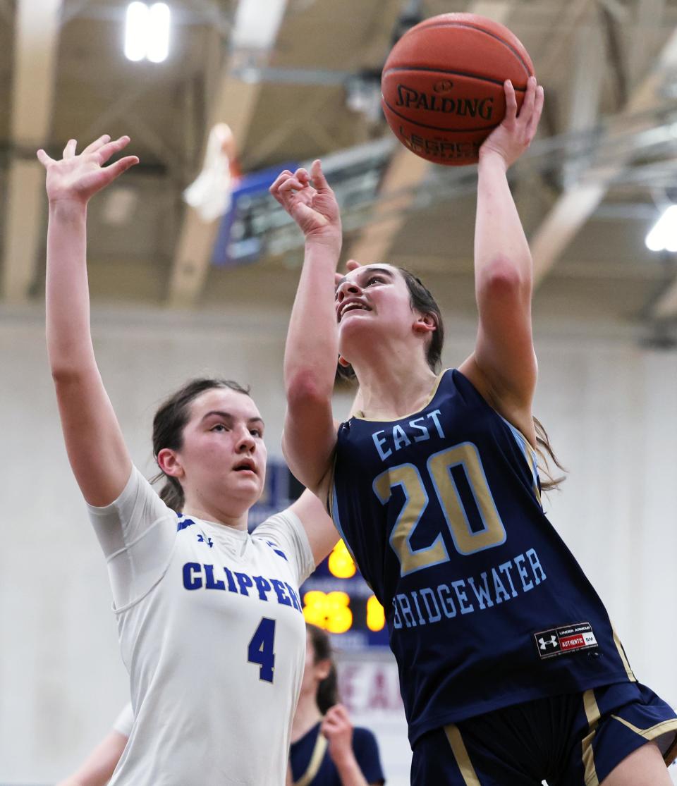 East Bridgewater's Liv McManus looks for room to shoot at the basket on Norwell's Alex Cassidy during a game on Tuesday, March 5, 2024.