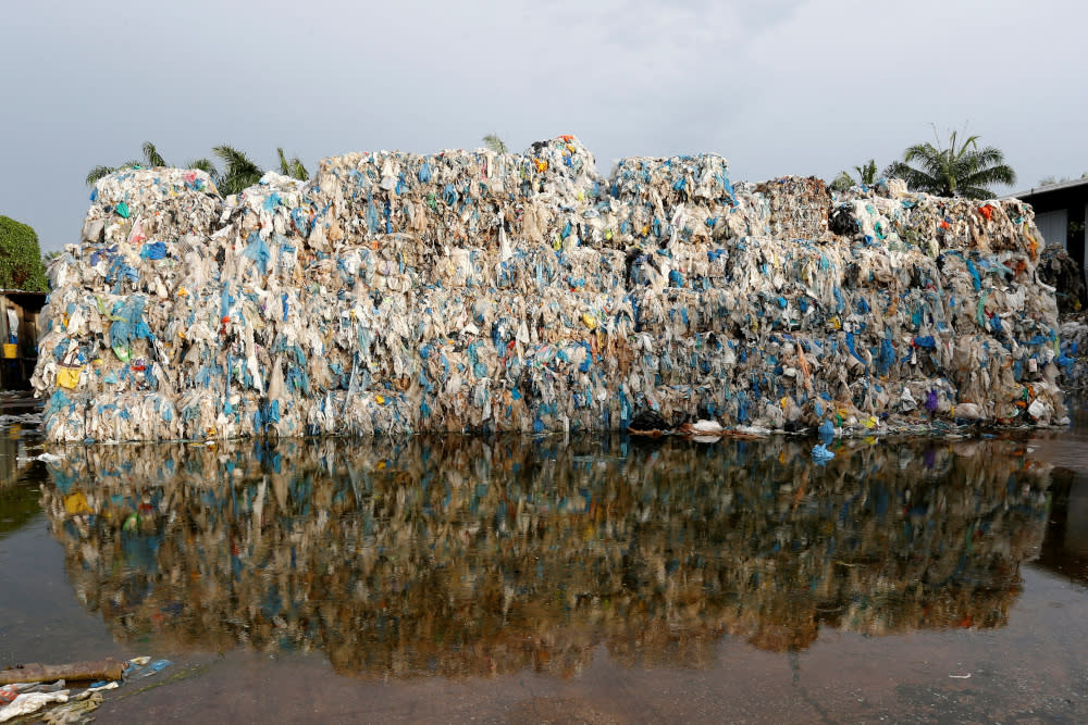 Plastic waste piled outside an illegal recycling factory in Jenjarom, Kuala Langat, Malaysia October 14, 2018. — Reuters pic
