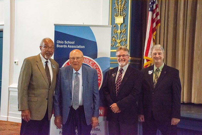 Lexington School Board President Robert Whitney was honored in 2021 by the Ohio School Boards Association Central Region. Pictured, from left, are Robert Heard, Sr. president OSBA; Robert Whitney; Kevin Archer, OSBA Central Region president; and Rick Lewis, CEO OSBA.