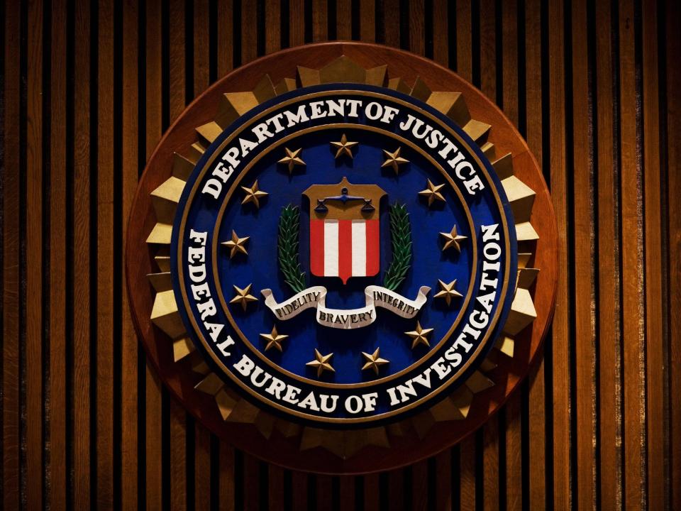 A crest of the Federal Bureau of Investigation is seen 03 August 2007 inside the J. Edgar Hoover FBI Building in Washington, DC.