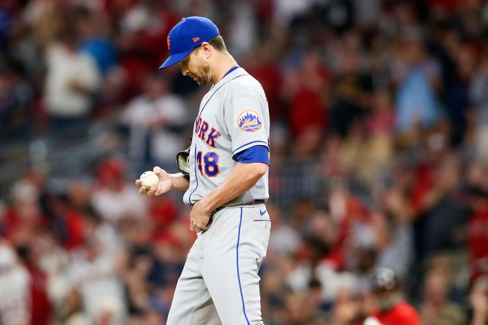 Sep 30, 2022; Atlanta, Georgia, USA; New York Mets starting pitcher Jacob deGrom (48) reacts after giving up a home run to Atlanta Braves third baseman Austin Riley (not pictured) in the second inning at Truist Park.