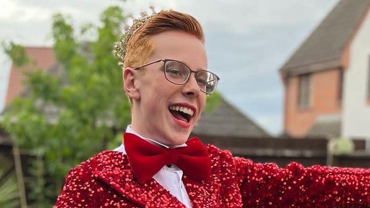 Teenager attending prom night in a gown