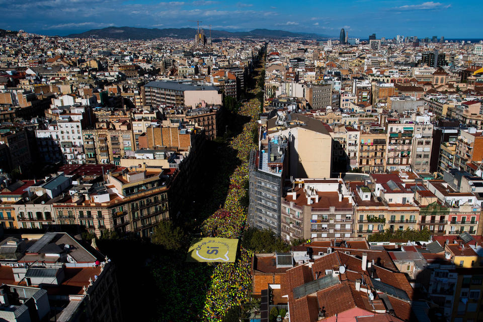 <p>SEPT. 11, 2017 – People march during a demonstration celebrating the Catalan National Day in Barcelona, Spain. The Spanish Northeastern autonomous region celebrates its National Day on September 11 marked by the secession referendum of the next October 1 which was approved by the Catalan Parliament and banned by the Spanish Government. (Photo: David Ramos/Getty Images) </p>