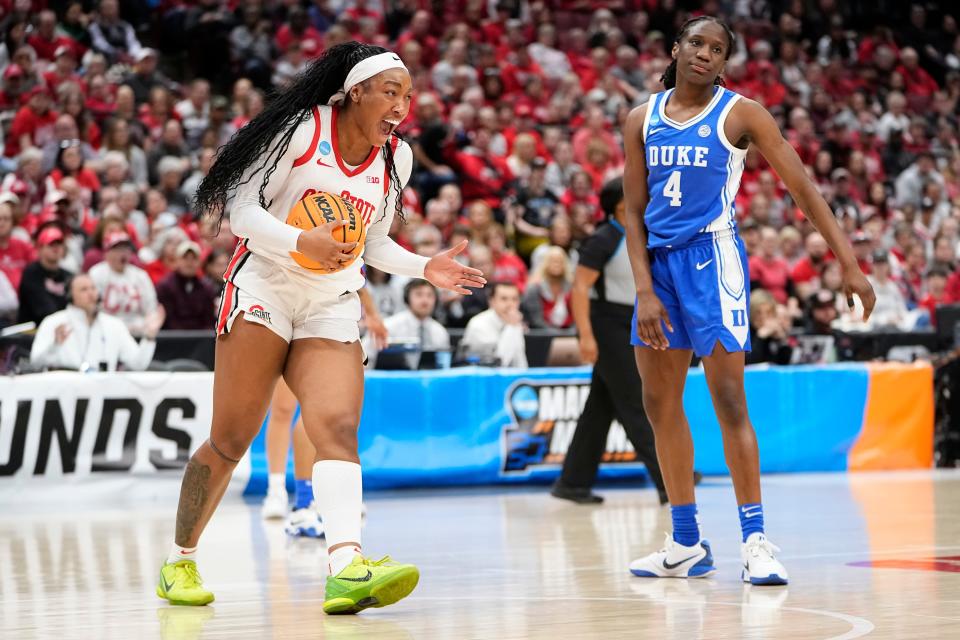 Mar 24, 2024; Columbus, OH, USA; Ohio State Buckeyes forward Cotie McMahon (32) reacts beside Duke Blue Devils guard Jadyn Donovan (4) during the first half of the women’s NCAA Tournament second round at Value City Arena.