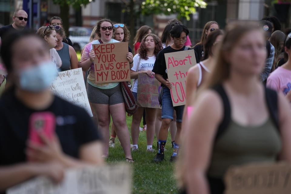 Some of the more than 100 students and other protesters who attended the Central Ohio Student-Led Rally for Reproductive Rights late Tuesday afternoon at the Ohio Statehouse to express outrage against the U.S. Supreme Court decision overturning Roe v. Wade.