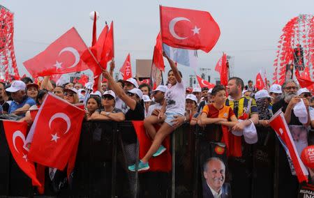 People attend an election rally of Muharrem Ince, presidential candidate of Turkey's main opposition Republican People's Party (CHP) in Istanbul, Turkey June 23, 2018. REUTERS/Huseyin Aldemir