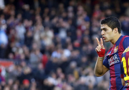 Barcelona's player Luis Suarez celebrates a goal against Cordoba during their Spanish First division soccer match at Camp Nou stadium in Barcelona December 20, 2014. REUTERS/Albert Gea