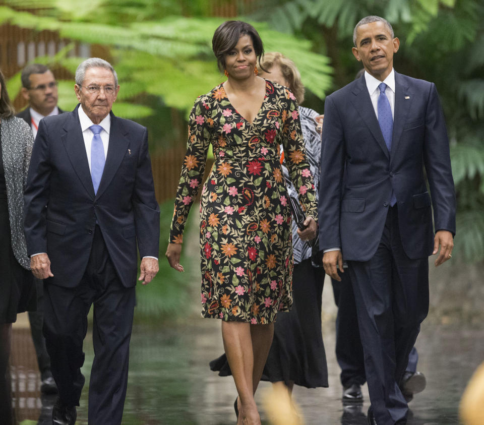 Michelle Obama in Naeem Khan with President Barack Obama and Cuban President Raul Castro at the Palace of the Revolution in Havana, Cuba.