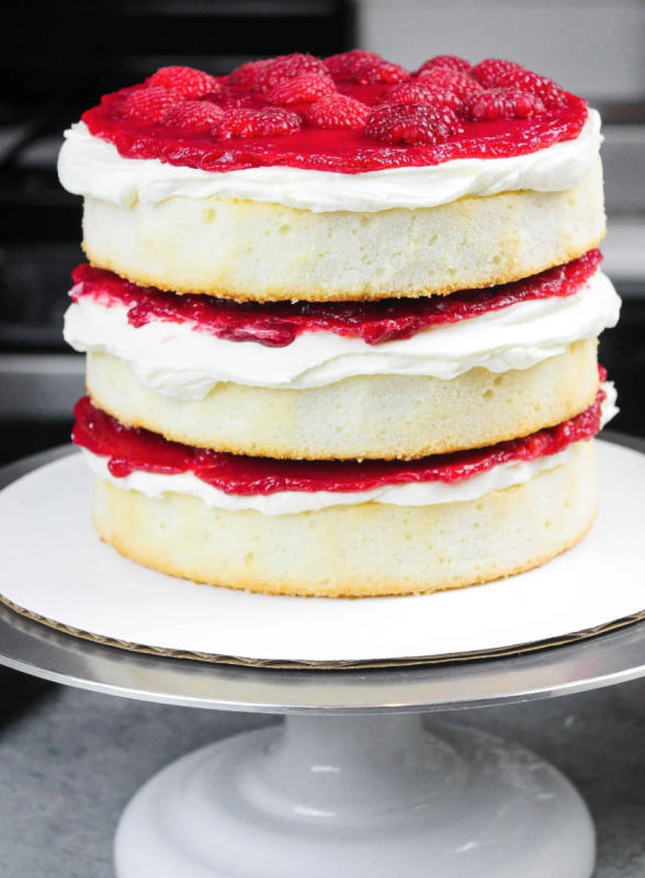 <p>Chelsweets</p><p>This white chocolate raspberry cake recipe is made with fluffy white cake layers and its white chocolate frosting is perfectly balanced with a tart raspberry filling!</p><p><strong>Get the recipe: <a href="https://chelsweets.com/white-chocolate-raspberry-cake/" rel="nofollow noopener" target="_blank" data-ylk="slk:White Chocolate Raspberry Layer Cake;elm:context_link;itc:0;sec:content-canvas" class="link ">White Chocolate Raspberry Layer Cake</a></strong></p>