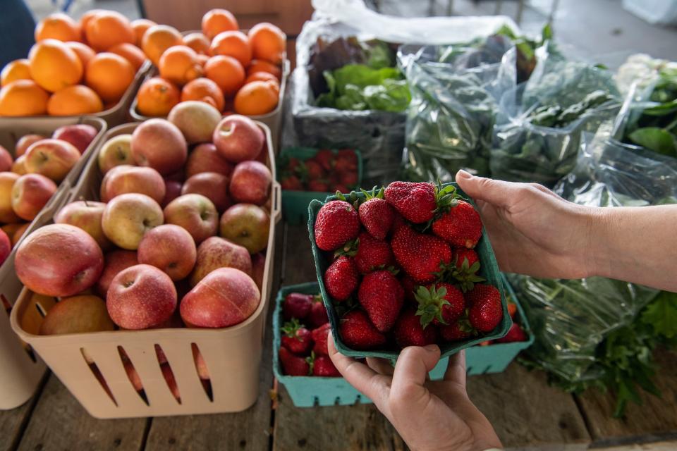 Strawberries are sold at the Farmers' Market in Nashville , Tenn., Friday, April 28, 2023.