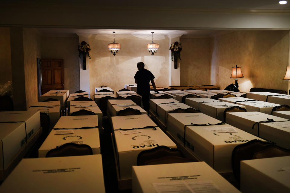 Omar Rodriguez organizes bodies in the Gerard Neufeld funeral home in Queens on April 22, 2020 in New York City. (Spencer Platt/Getty Images)