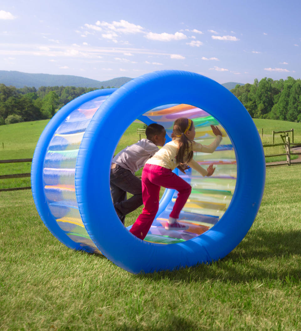 Roll With It! Giant Inflatable Colorful Rolling Wheel. Image via HearthSong.